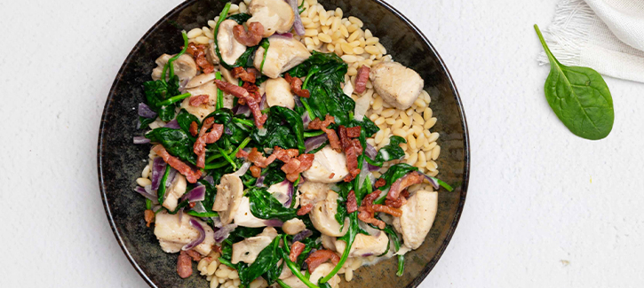 Cremiger Reis mit Spinat und Champignons