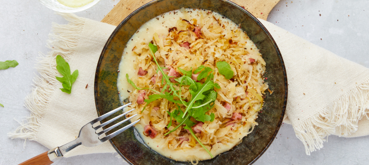 Sauerkraut-Stampf mit Schinkenwürfeln
