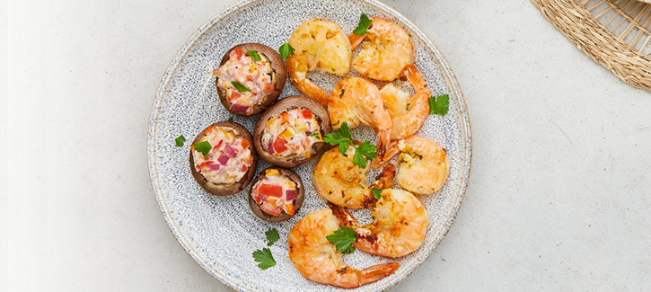 Knoblauch-Zitronen-Gambas mit gefüllten Champignons